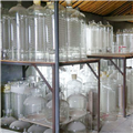 Upper and lower section flaring coil heat exchanger